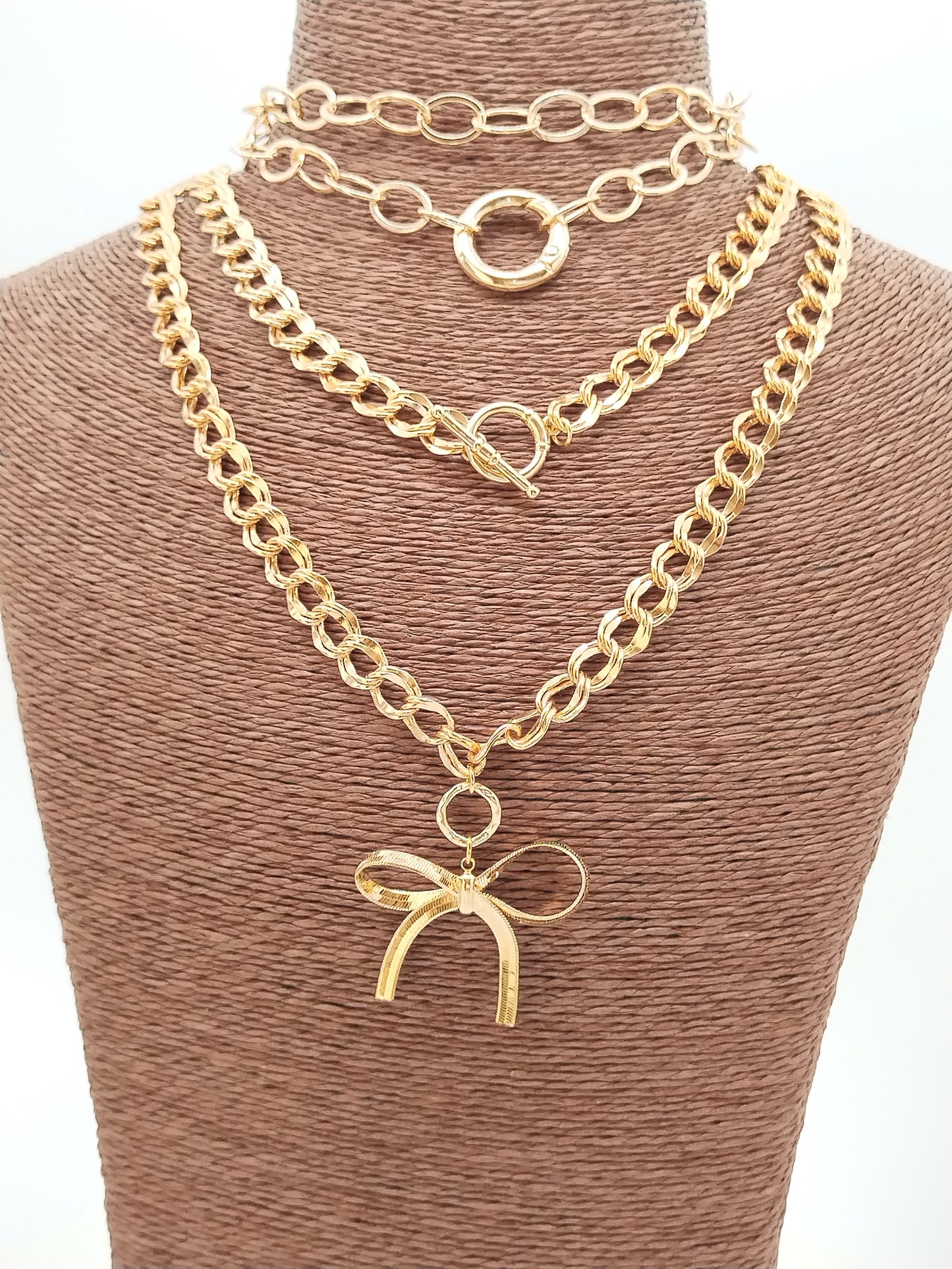 Gold oval chain necklace 24 inches modeled showing flattering length