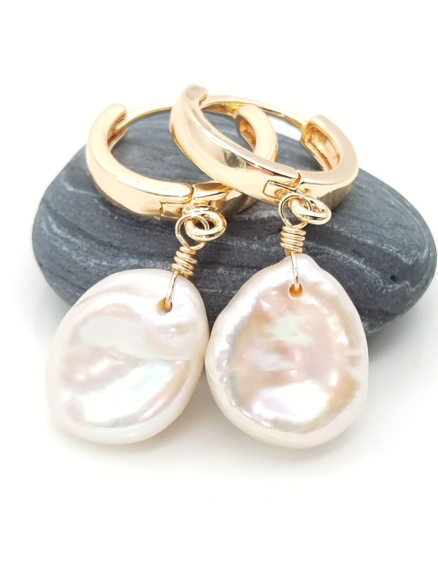 Gold keshi pearl hoop earrings lifestyle shot demonstrating elegant statement jewelry