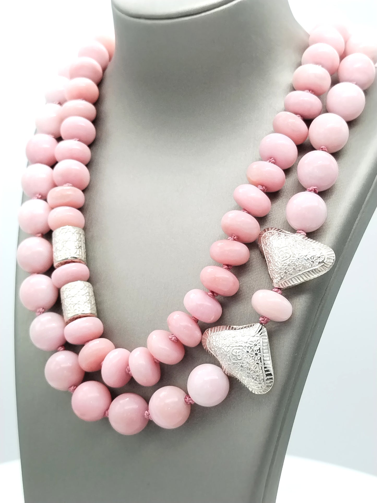 Artisan detail of Karen Hill Tribe sterling silver heart beads on pink opal necklace