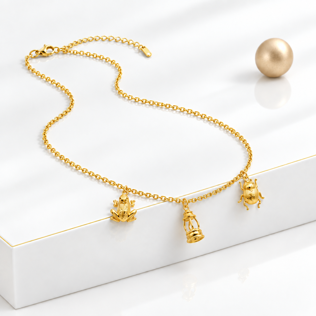Adjustable 18k Gold Plated necklace with three miniature dangling charms