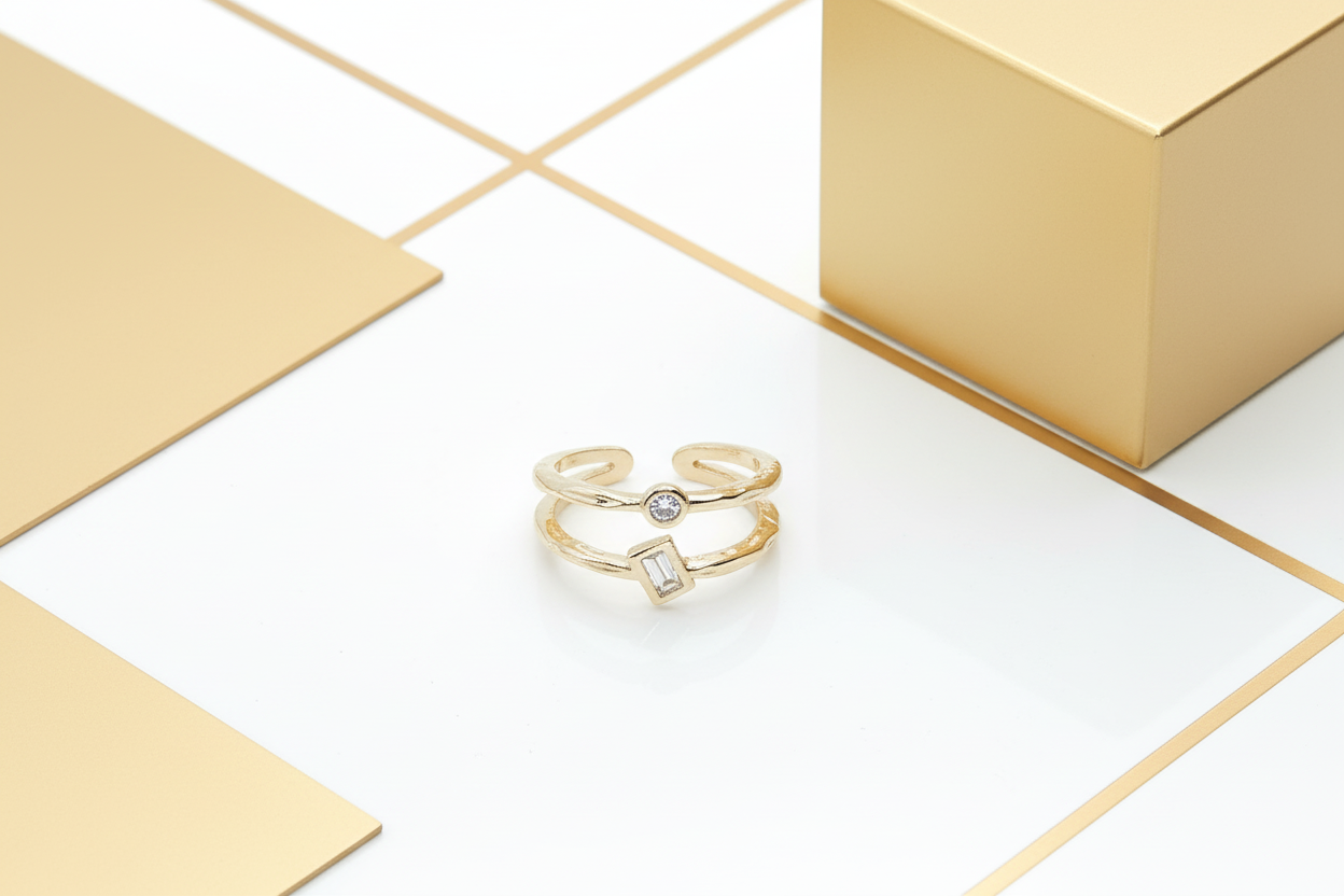 Double band gold plated ring with round and baguette cubic zirconia displayed in elegant white and gold setting