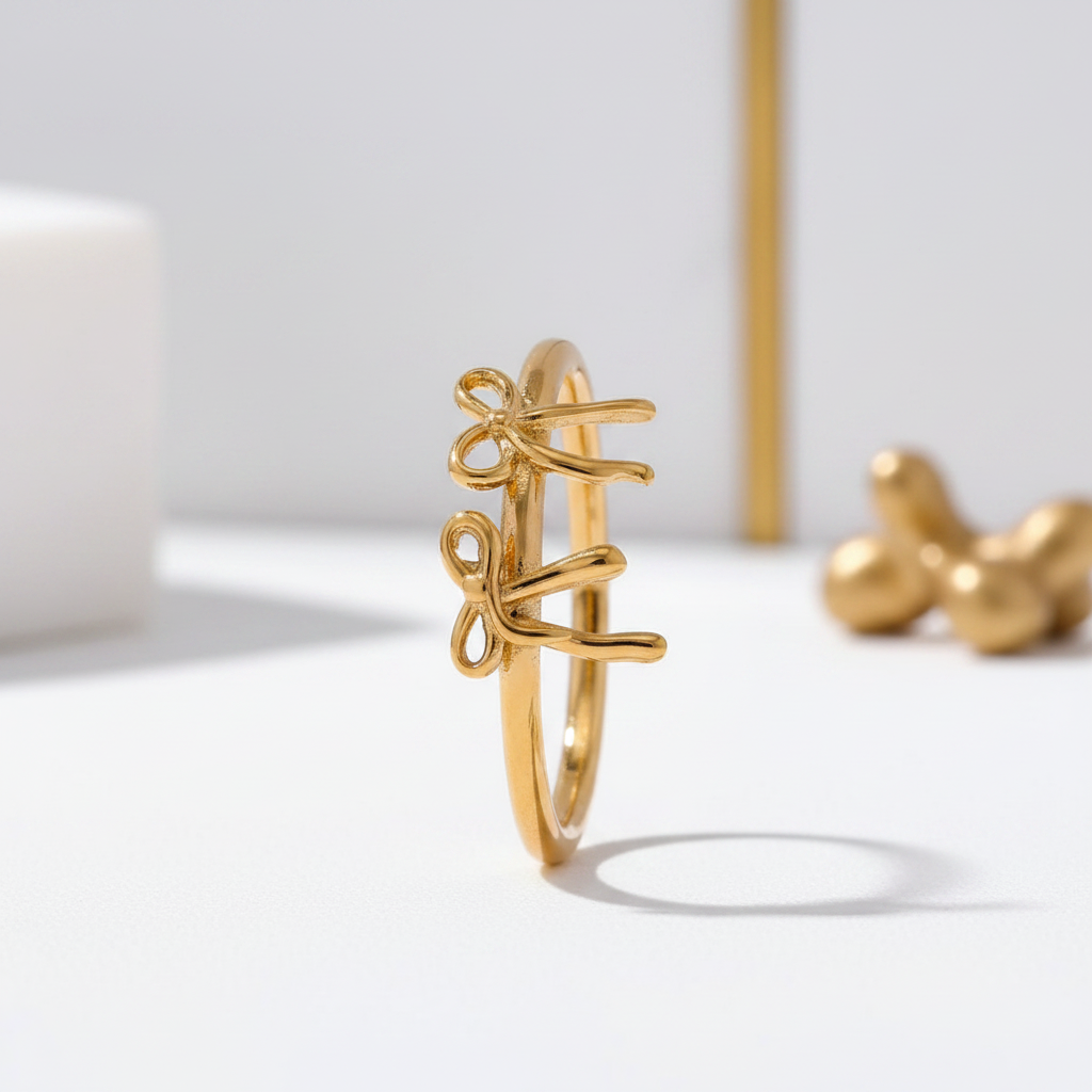Slim gold band ring with double bow detail – waterproof tarnish-resistant PVD gold – Ms Friesch