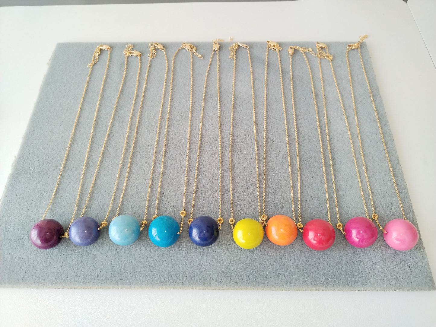  Pink tagua bead gold plated necklace against white background - natural vegan jewelry