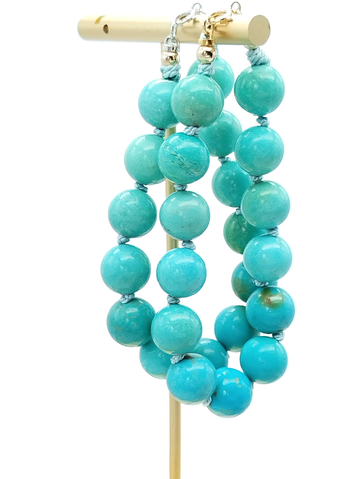 Close-up of Campitos turquoise beads showing natural blue-green color and matrix patterns