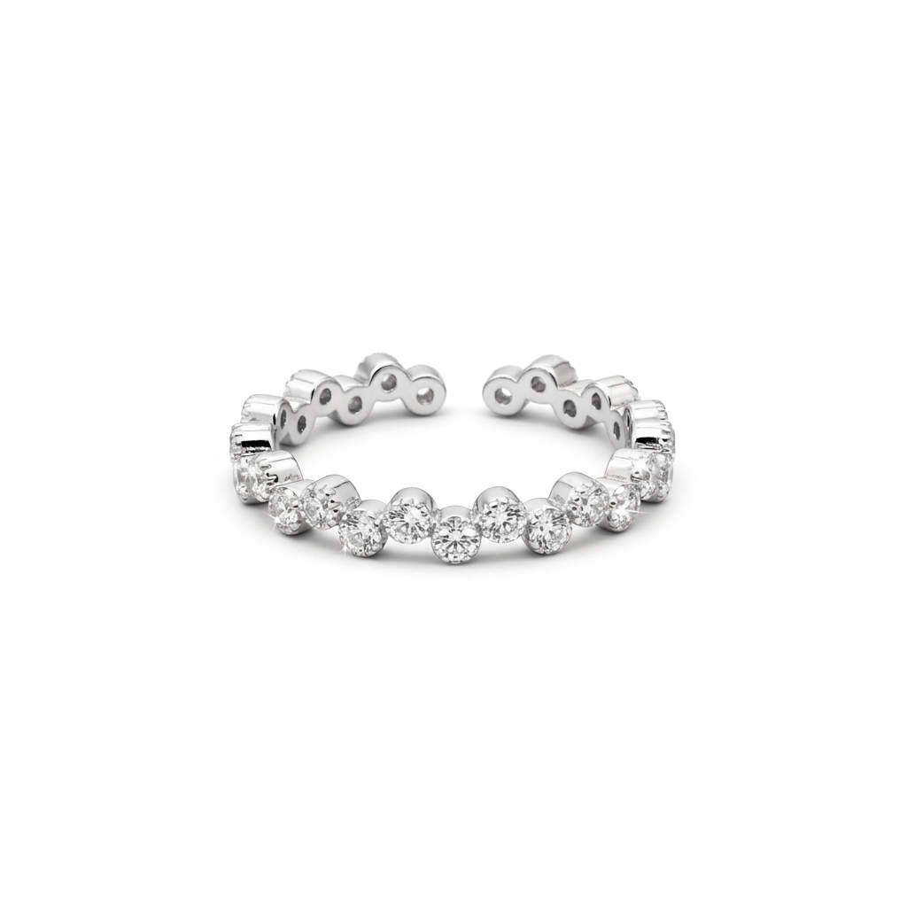 Adjustable rhodium silver plated CZ ring with round bezel settings and an open zigzag band