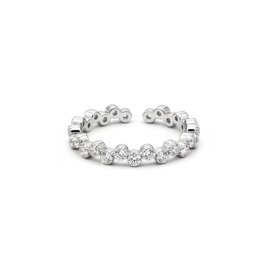 Adjustable rhodium silver plated CZ ring with round bezel settings and an open zigzag band