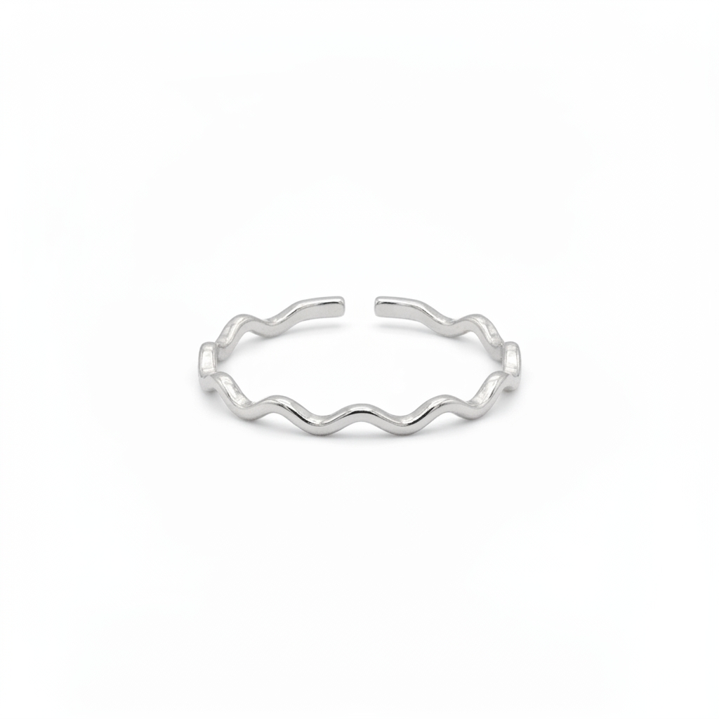 Rhodium plated wave ring with a delicate band and adjustable open back on a white background