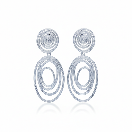 Silver rhodium plated spiral stud earrings with textured concentric circles on white background