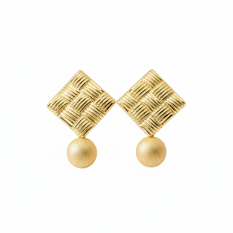 Large gold statement stud earrings with 10mm dangle bead detail, close-up view