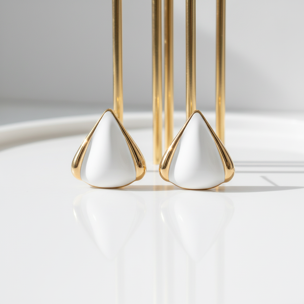 Close-up white enamel chunky gold hoops 18k PVD stainless steel detail