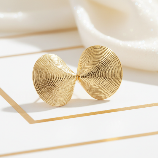 Bold chunky shell inspired gold plated stud earrings sculptural organic design
