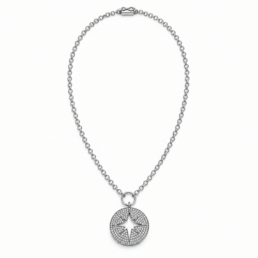 Oxidized sterling silver chain with a gunmetal open star pendant and cubic zirconia pavé on a white background