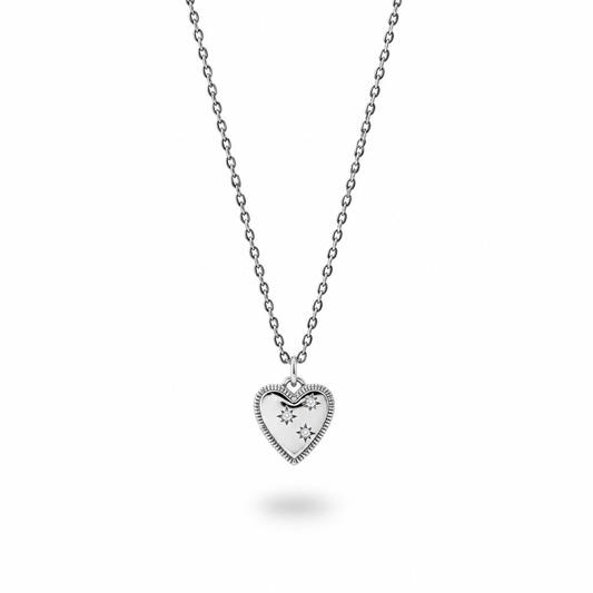 Silver plated heart pendant with three cubic zirconia stones on an oxidized sterling silver chain against a white background