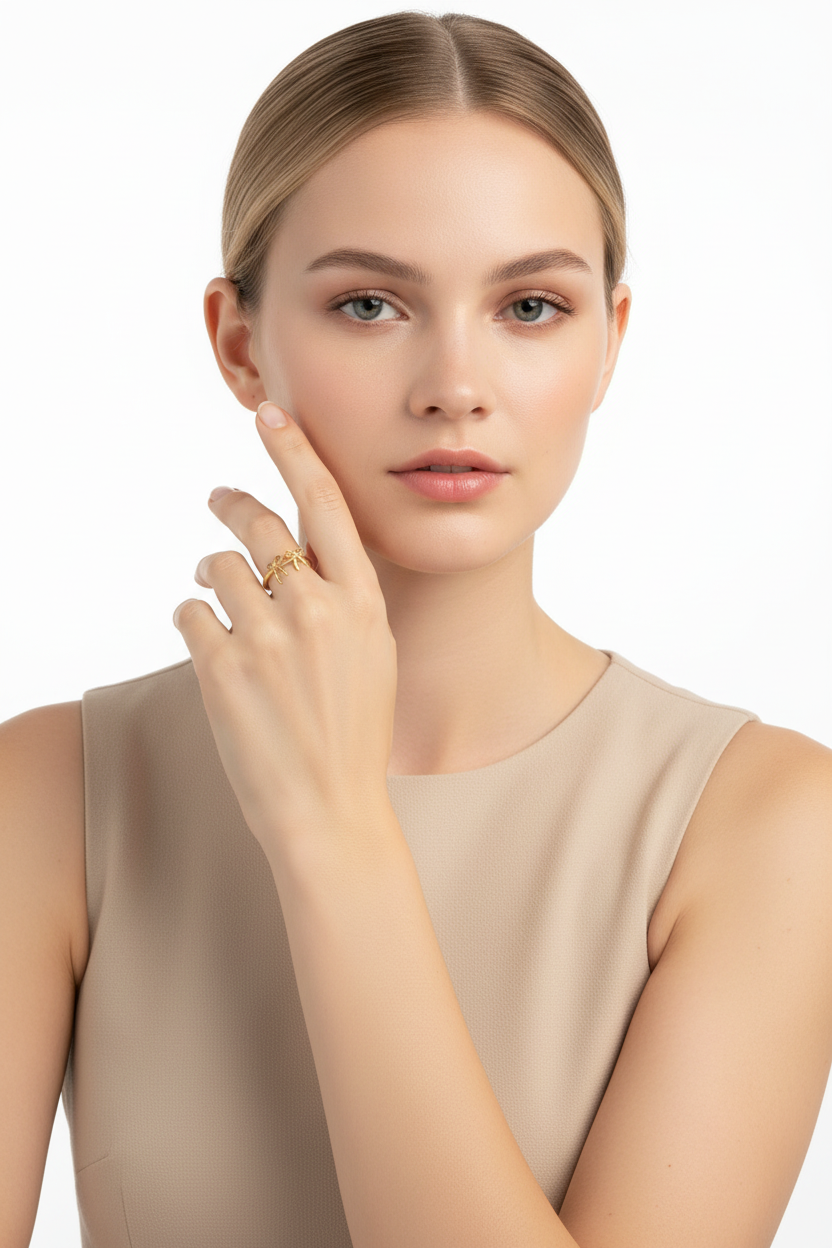 Nordic model wearing double bow 18k PVD gold ring – feminine stainless steel band ring – Ms Friesch
