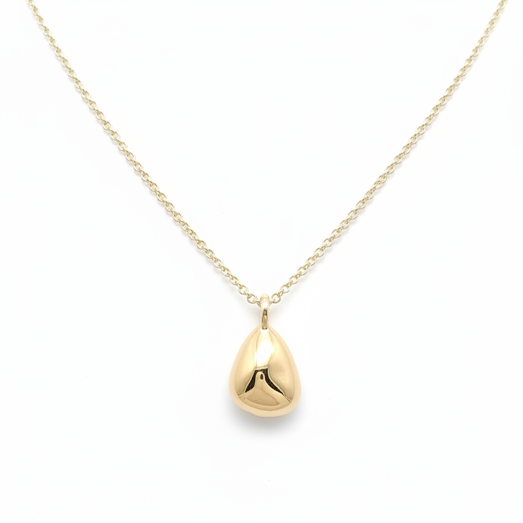 Drop charm pendant necklace with 14k gold filled chain on white background - gold plated charm by Ms Friesch