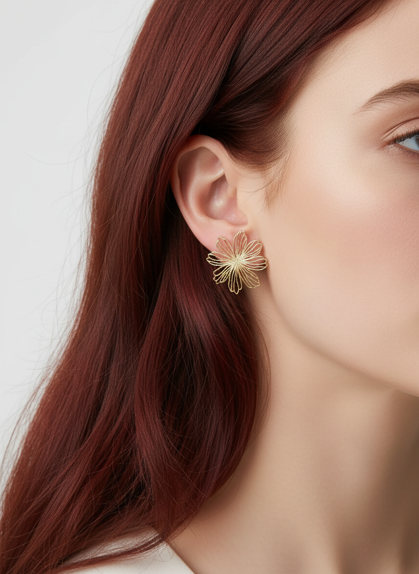 Flower earrings on red hair model