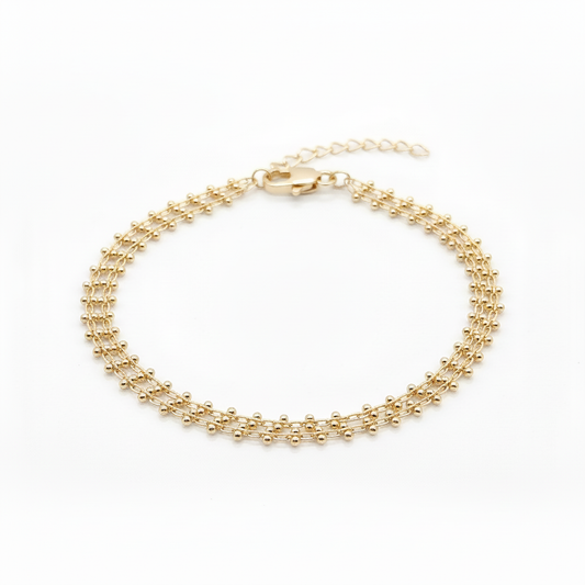 18k gold plated double chain bracelet closed on white background with soft shadow | Ms Friesch