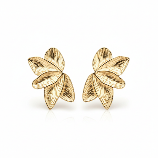 Large statement flower stud earrings in 18k PVD gold stainless steel on white background
