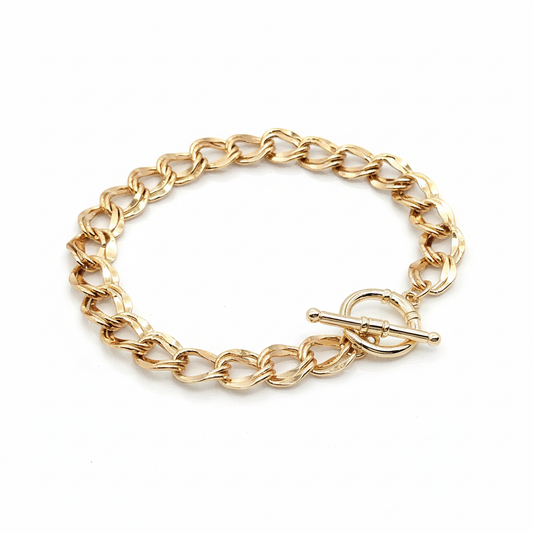 18k gold plated curb chain bracelet with toggle clasp on white background | Ms Friesch