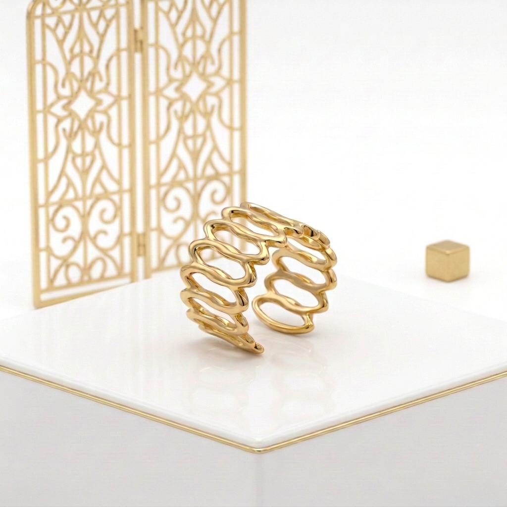 Open oval stainless steel ring with 18k PVD Gold coating and a wide band