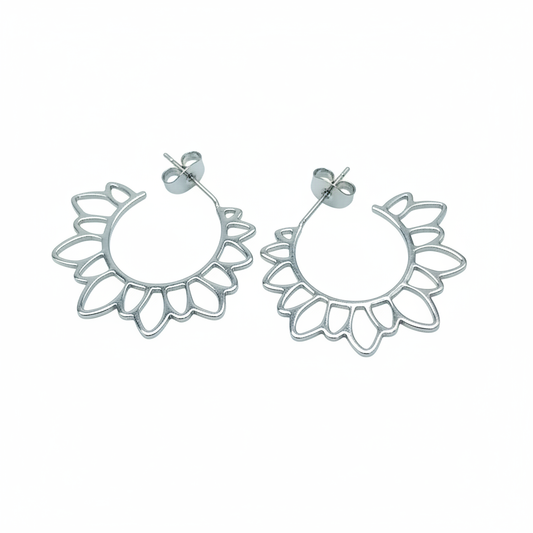 Large silver open hoop earrings on clean white background