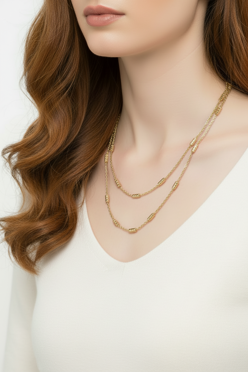 Long gold chain necklace worn doubled around neck 18K gold plated layering necklace on model