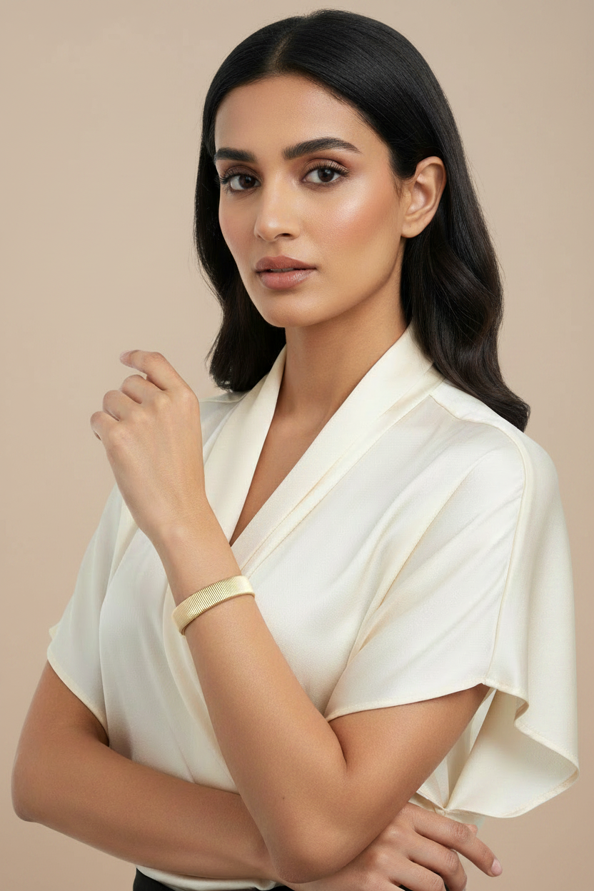 18k PVD gold open cuff bracelet worn on wrist, sleek 10mm wide stainless steel bangle, waterproof statement bracelet, Ms Friesch
