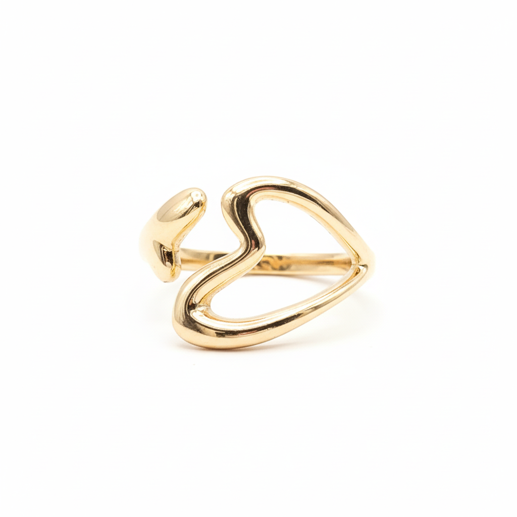 Woman wearing open heart gold ring - elegant romantic jewelry
