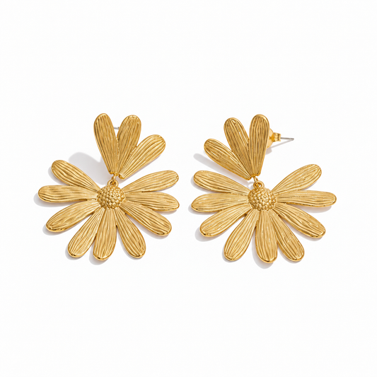 Oversized flower drop earrings in 18k PVD Gold with textured petals and raised floral centres