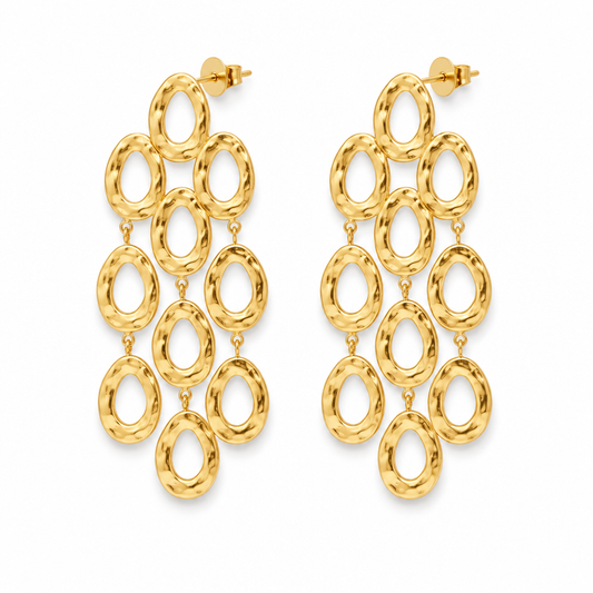18k PVD Gold chandelier earrings with cascading textured oval rings and stud backs on a white background