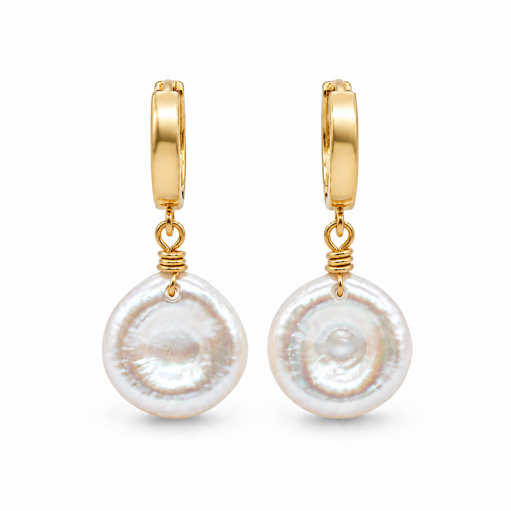 Natural keshi pearl hoop earrings with hand wrapped 14K gold filled wire on a white background