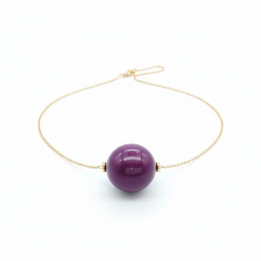 Purple tagua nugget necklace with 18k gold plated chain on white background - sustainable vegetable ivory jewelry