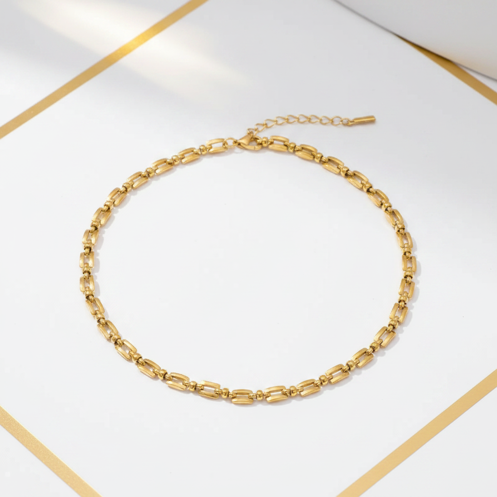 Small link chain necklace 18k PVD gold hanging white and gold background – Ms Friesch
