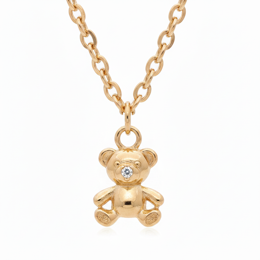 18k gold plated teddy bear charm pendant necklace with CZ nose detail on gold filled chain, white background
