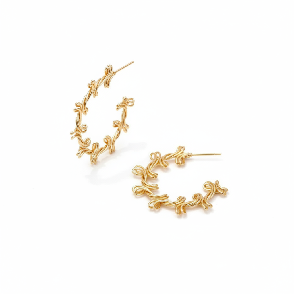 Large 38mm twisted gold plated open hoop stud earrings with sculptural curves on white background
